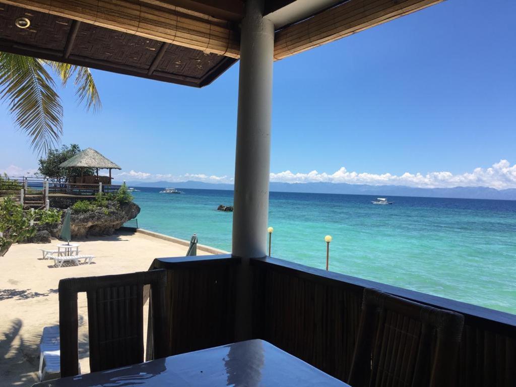 Tauig Beach Resort Moalboal Buitenkant foto