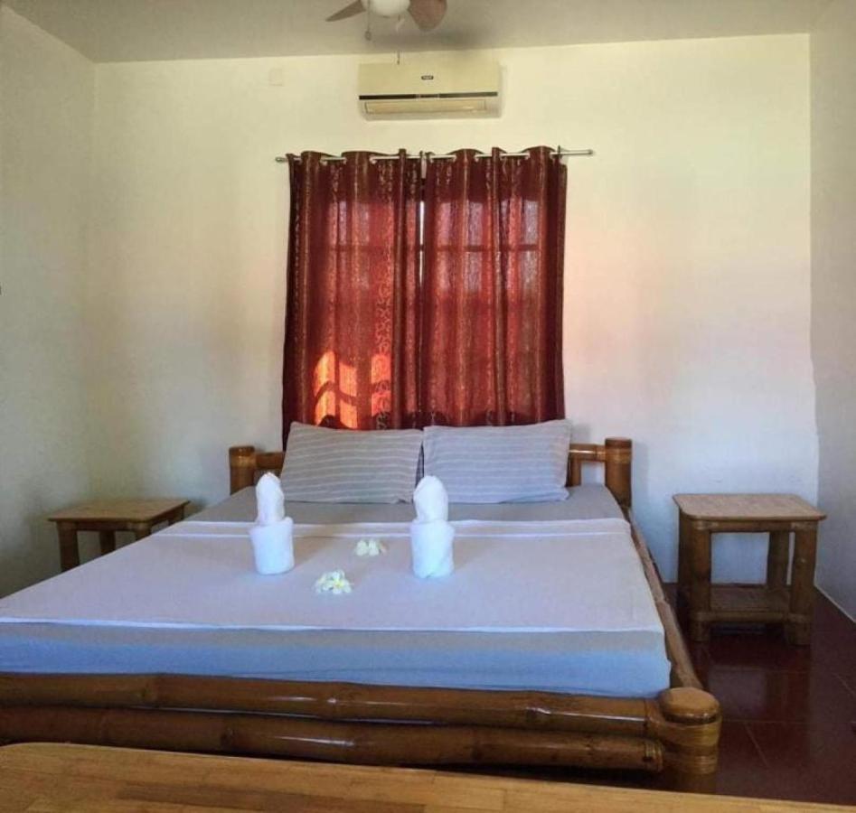 Tauig Beach Resort Moalboal Buitenkant foto
